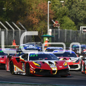 Photo of various racing cars on a circuit