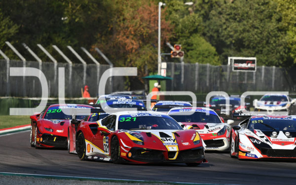 Photo of various racing cars on a circuit